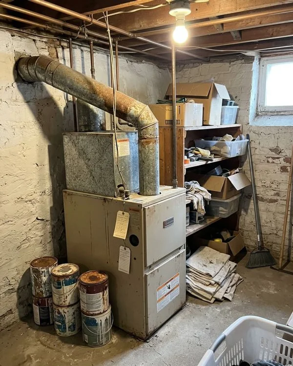 18-year-old gas furnace in a Davisville basement before conversion