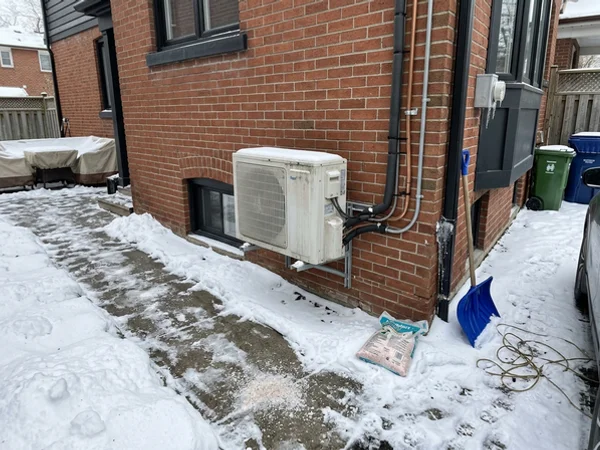 After: Daikin Fit heat pump beside a Leaside home