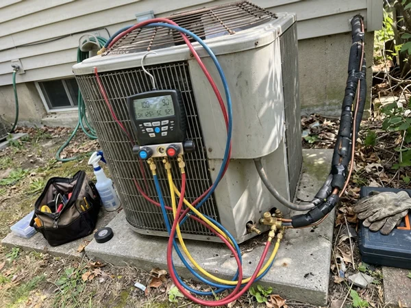 Digital refrigerant gauges showing superheat and subcooling readings