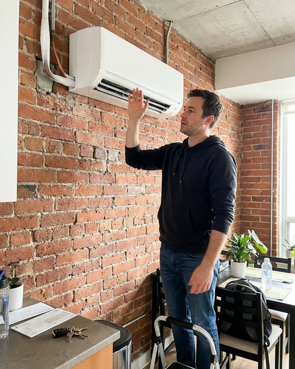 Frosted suction line at a mini-split head before the leak repair