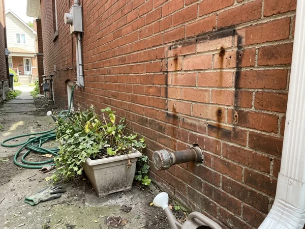 Gas meter removed from a brick wall after full electrification