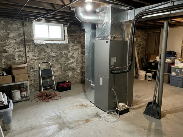 Mitsubishi Hyper-Heat ducted air handler in a Rosedale basement