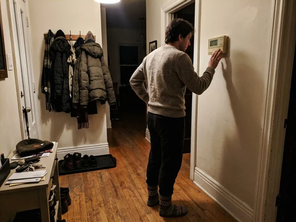 Thermostat switched to emergency heat mode