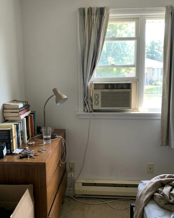 Window AC and baseboard heater before the Fujitsu install